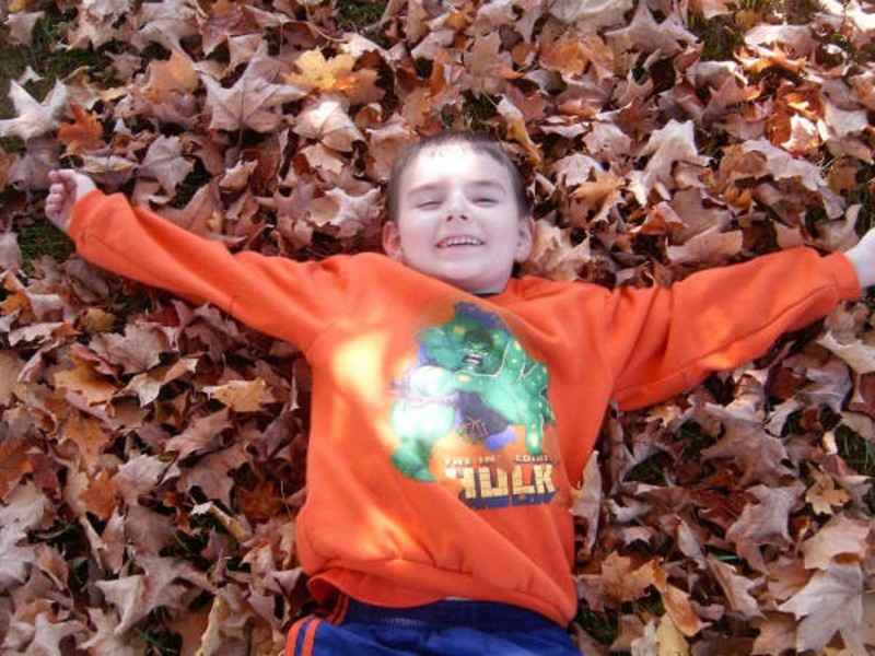 Nick in leaves.JPG